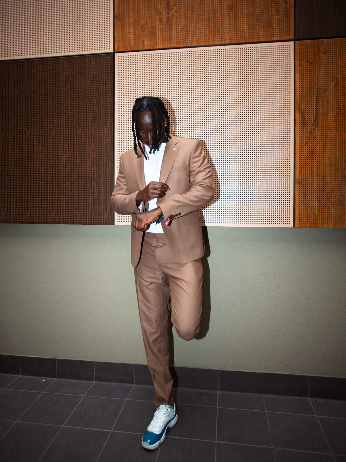 Tan suit — corridor